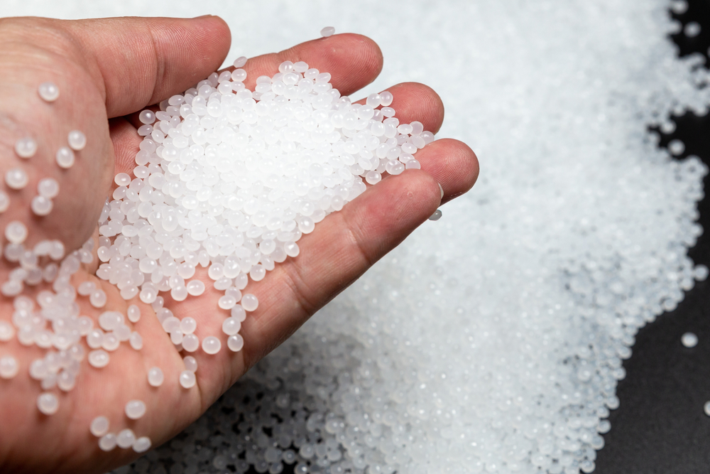 PET pellets hand clear