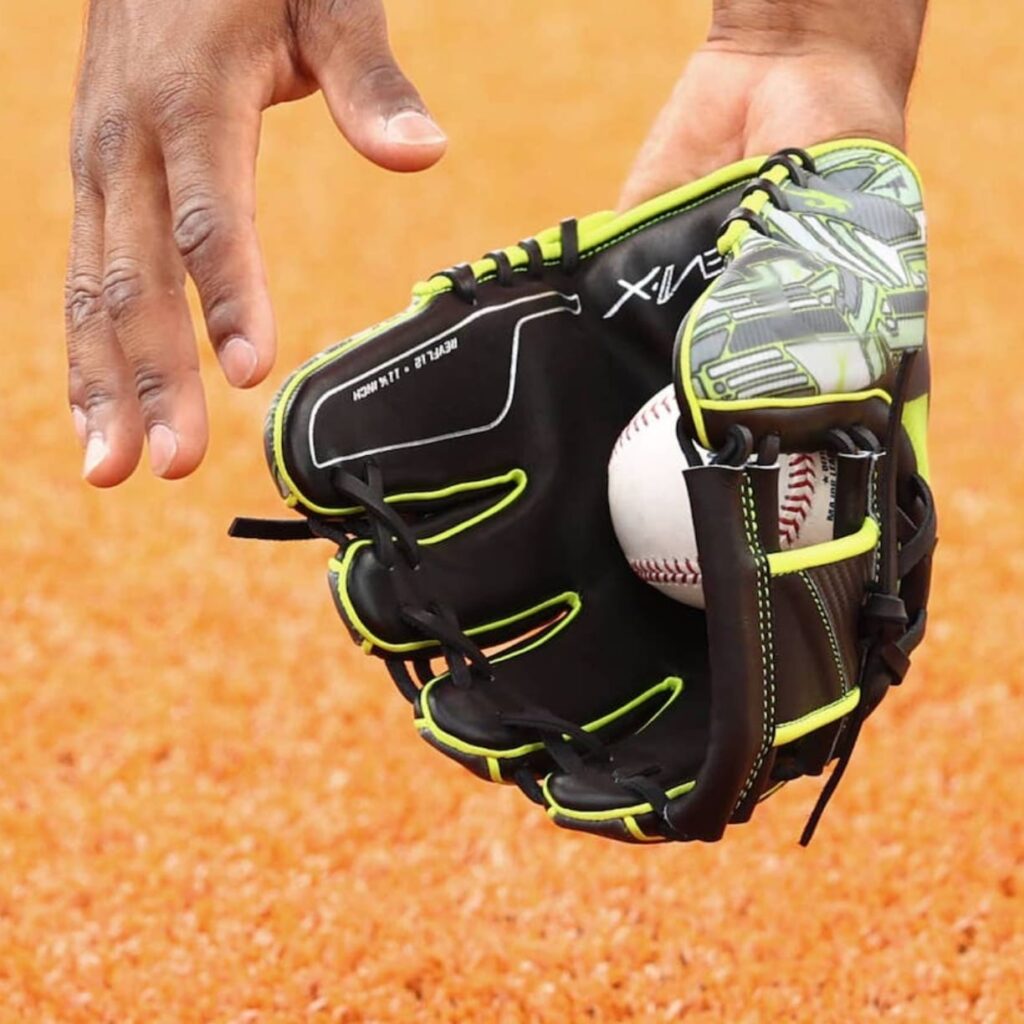 Rawlings REV1X 3D printed baseball glove catching a ball