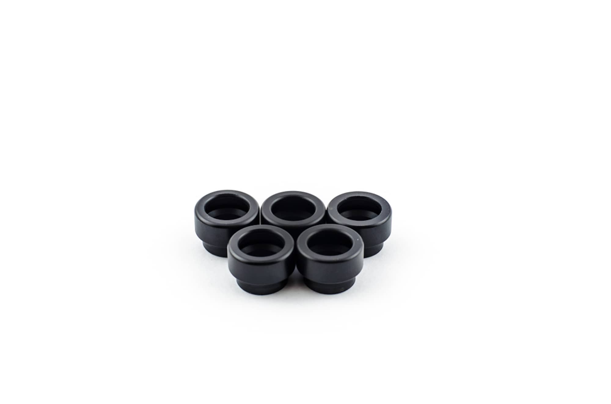 small black Delrin pieces